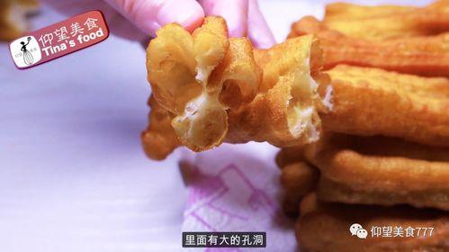 炸油条视频,传统美食制作全过程揭秘